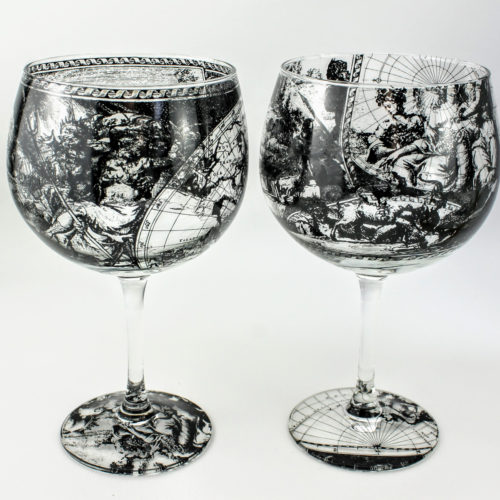 Gin and Tonic cocktail glasses with map design features allegorical scenes representing 'Fire' by war and destruction, 'earth' by harvesting