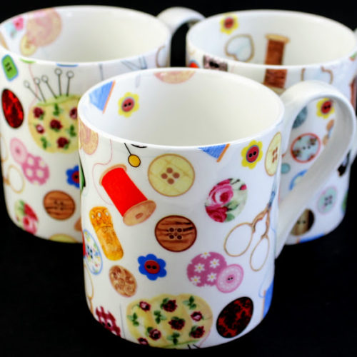 Stitching and sewing Bone china mug with buttons bobbins & thimbles