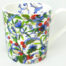 Blue Christmas bone china mug with mistletoe trellis