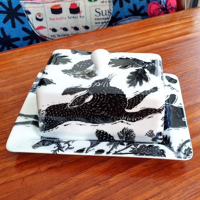 Bone china butterdish, woodcut style illustrations of woodland animals