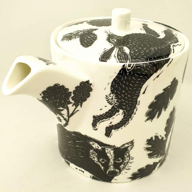 Large british bone china teapot, woodcut folk design of badger and hares