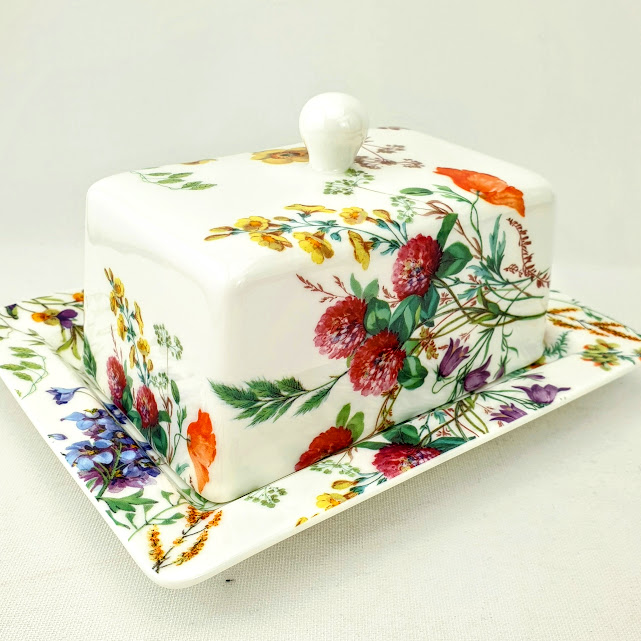 Butterdish with clover and other meadow flowers