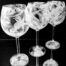 3 wine goblets. decorated with frosted sea creatures including sea horse. starfish. coral. and shells